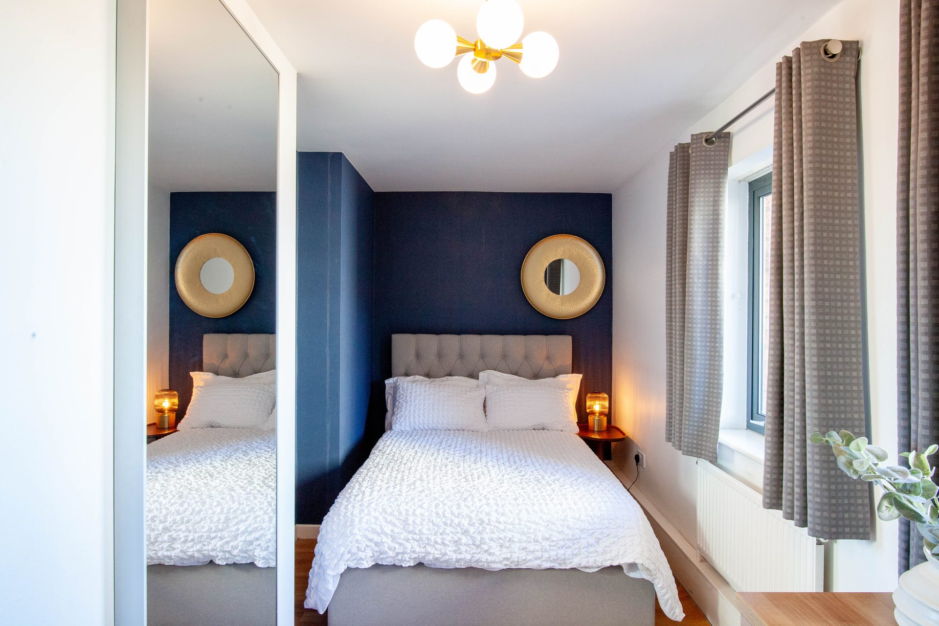 Bedroom navy and gold